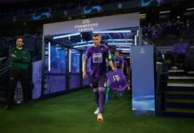 FM23 Best young centre-backs - Game Key Art of a player entering the pitch