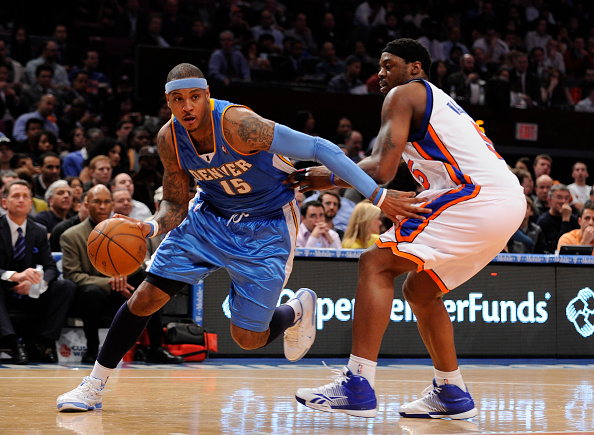 Carmelo Anthony build - Melo dribbling past an opponent