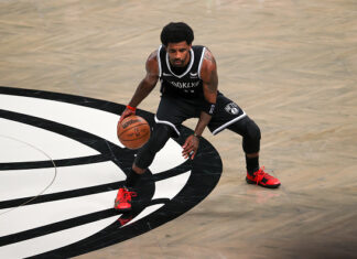 Kyrie Irving Build - Irving practicing his ball handling before a game